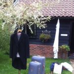 Bride & Grooms outfits outside our luxury holiday cottage
