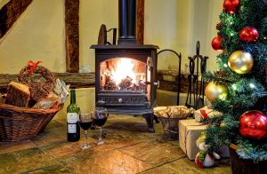 Christmas in front of the log fire at our luxury Self-Catering holiday cottages in Suffolk