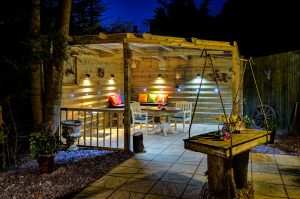 Garden room by night - holiday cottages in Suffolk