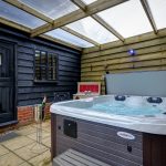 hot tub in cottage garden room