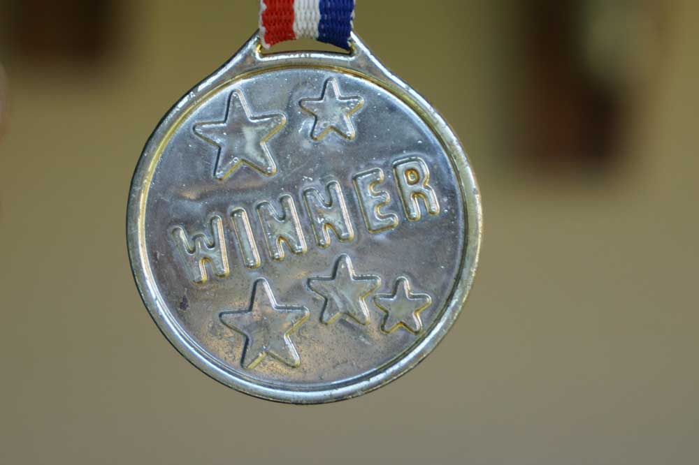 dog holiday competition medal