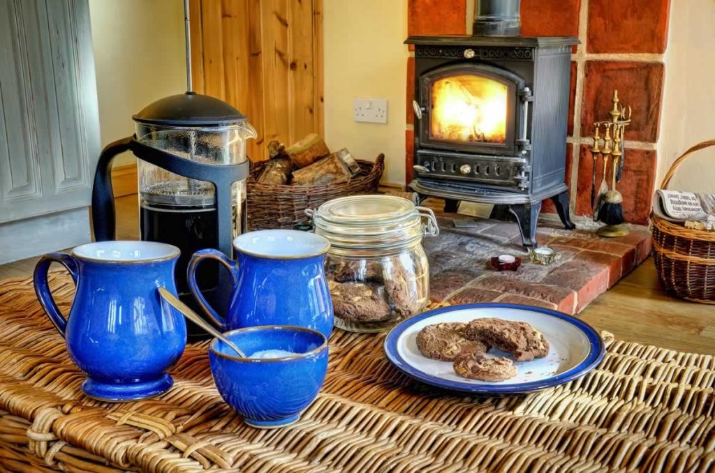 Alde Barn wood bruning stove and coffee photo