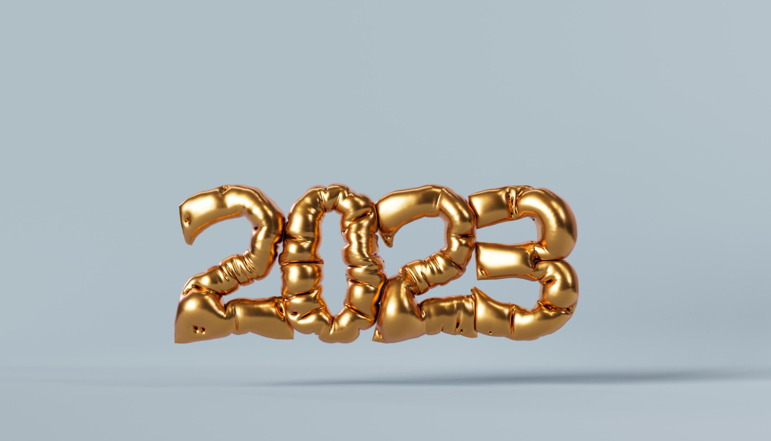 The number 2023 inflated in gold balloons